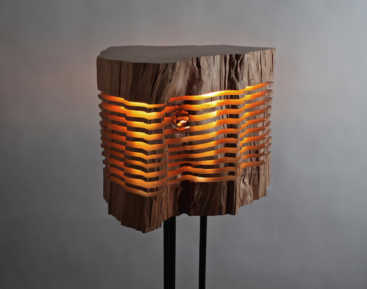 This designer turns firewood into beautiful lamps.