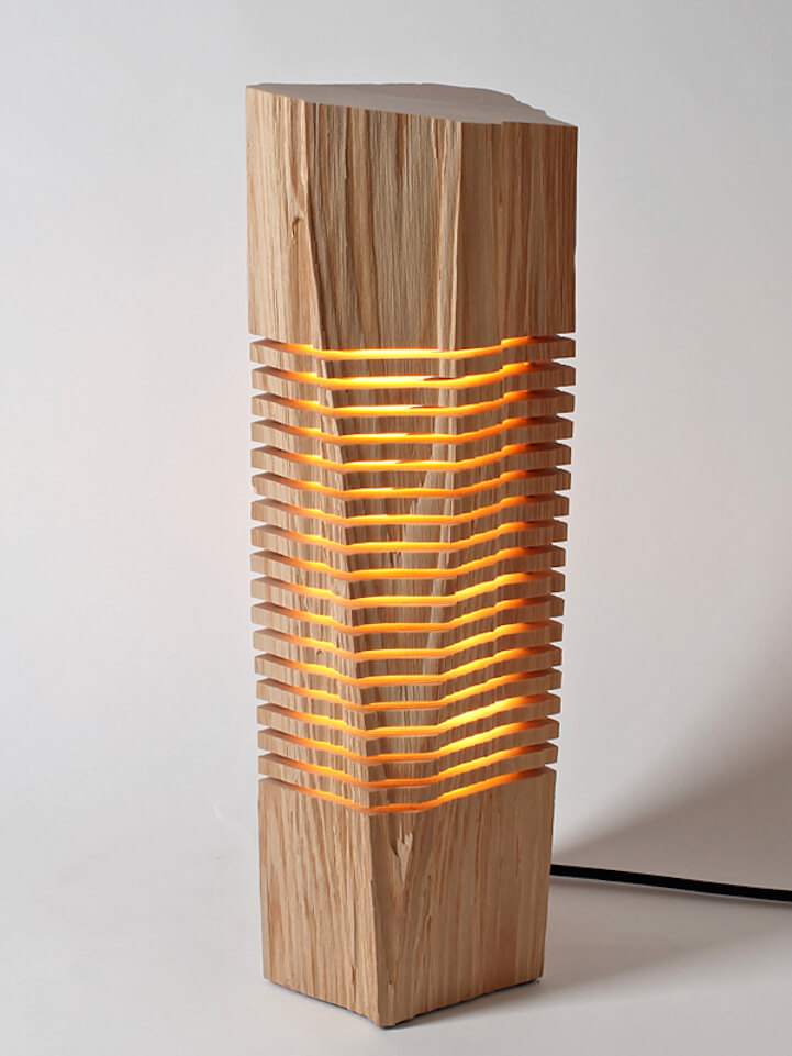 This designer turns firewood into beautiful lamps.