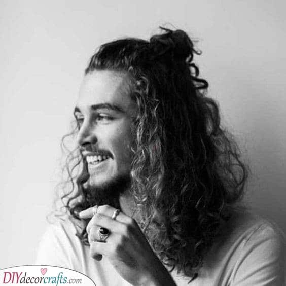 A Half Up Man Bun - Laidback Long Curly Hairstyles for Men